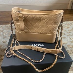 Chanel medium quilted leather hobo bag. Gold  with mixed metal/ leather strap.